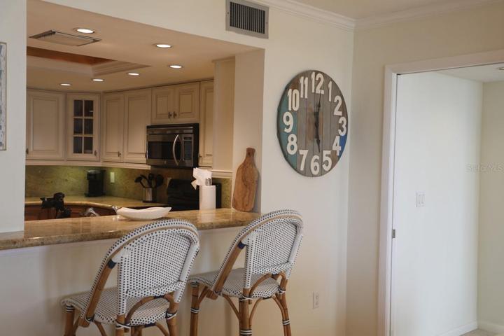 Breakfast bar with granite countertops
