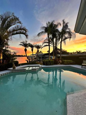 Pool with Stunning Sunset and Water Views