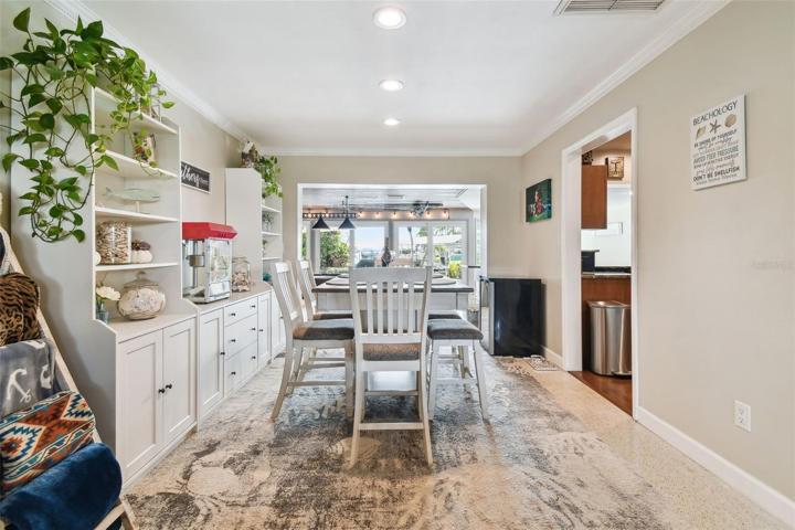 Dining Area looking to Backyard Pool & Water Views