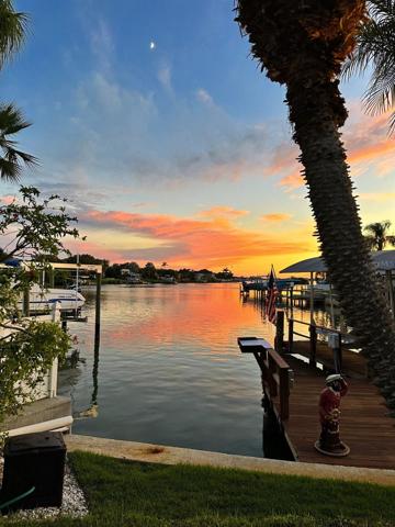 Pool with Stunning Sunset and Water Views