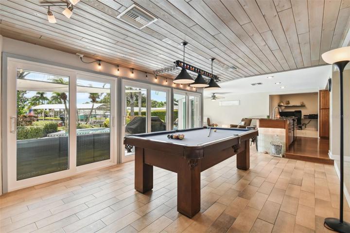 Family Room w/Billiard Table & Sliders to Backyard, Pool & Water
