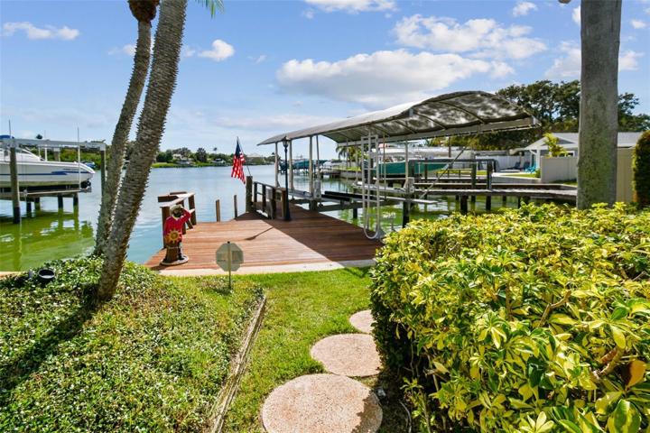 Backyard Steps Leading to Boat Dock & Covered Boat Lift