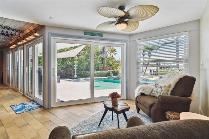 Family Room w/View of backyard, Pool & Water