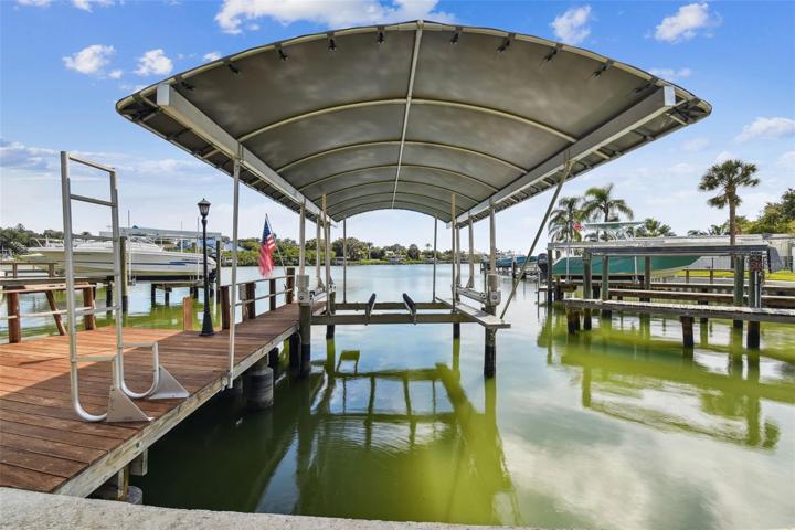 Covered Boat Lift and Dock