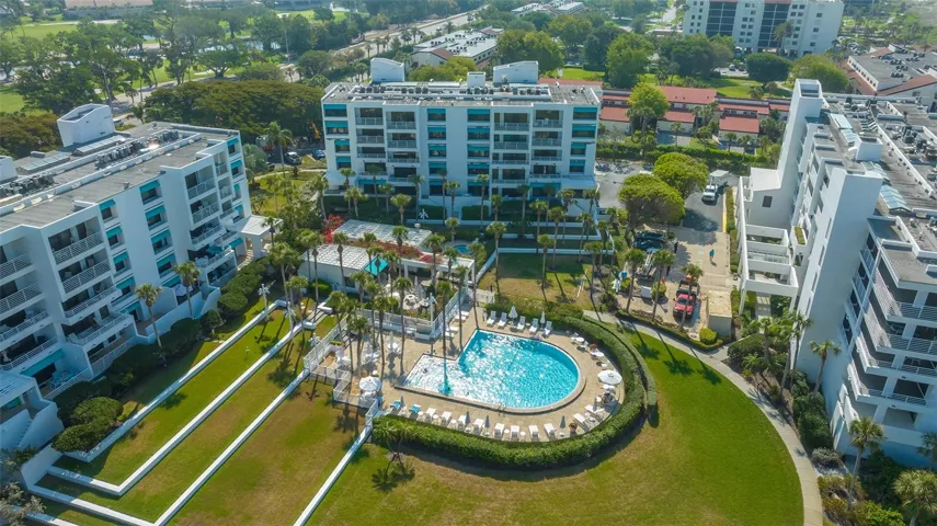 Aerial view of building and pool