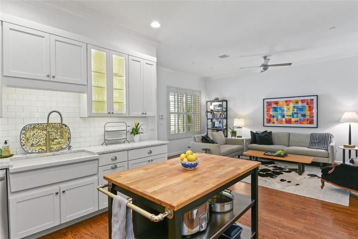 Kitchen is open to additional living space/den