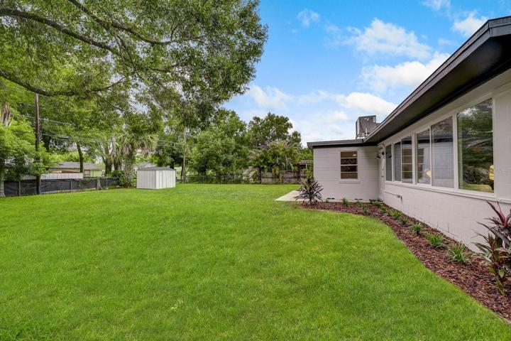 Large backyard with room for a pool