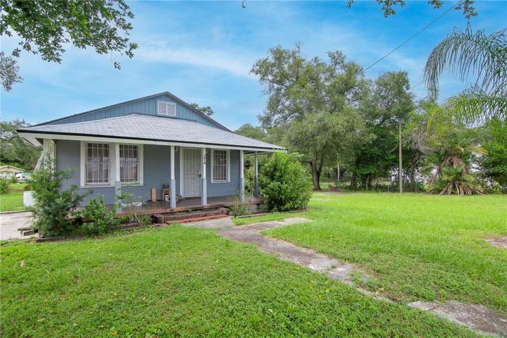 Front of home with View of the double lot to the right side