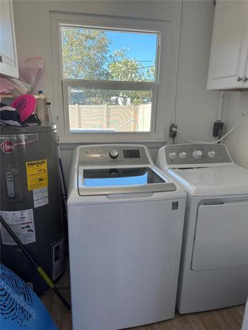 laundry room with full size washer and dryer