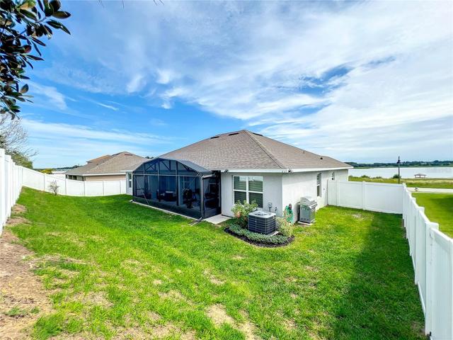 Fenced Side and Backyard