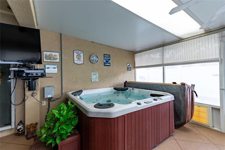 Skylights and hot tub included with this home.