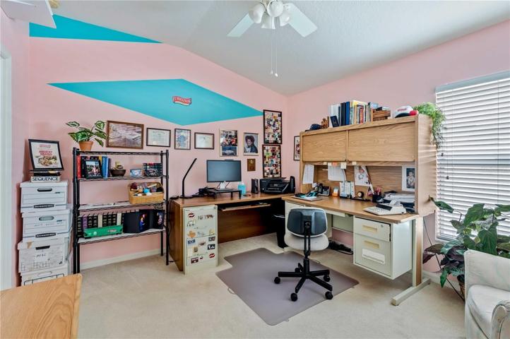 Bedroom four functions as the office.