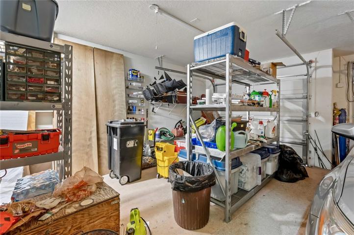 Garage has ample space for storage.