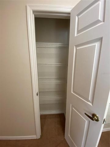 Interior of Hallway Linen Closet