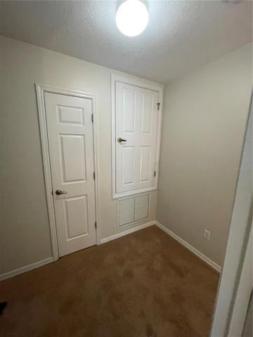 Second Floor Landing with Linen Closet Door and AC Closet Door