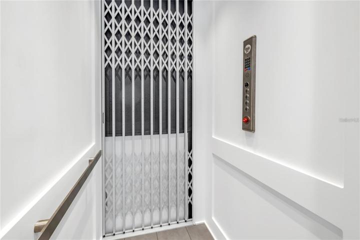 NEW CUSTOM INSTALLED ELEVATOR SERVICING THREE FLOORS