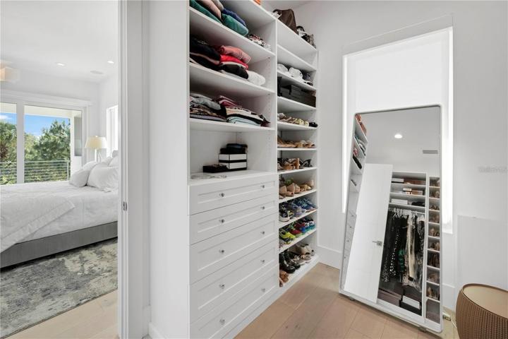 CUSTOM PRIMARY WALK-IN CLOSET