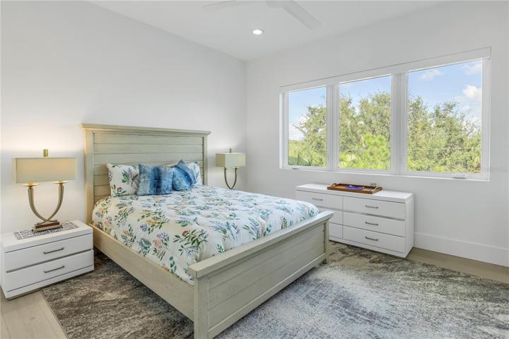 SECOND BEDROOM WITH GOLF COURSE VIEWS AND IT'S OWN IN-SUITE BATH