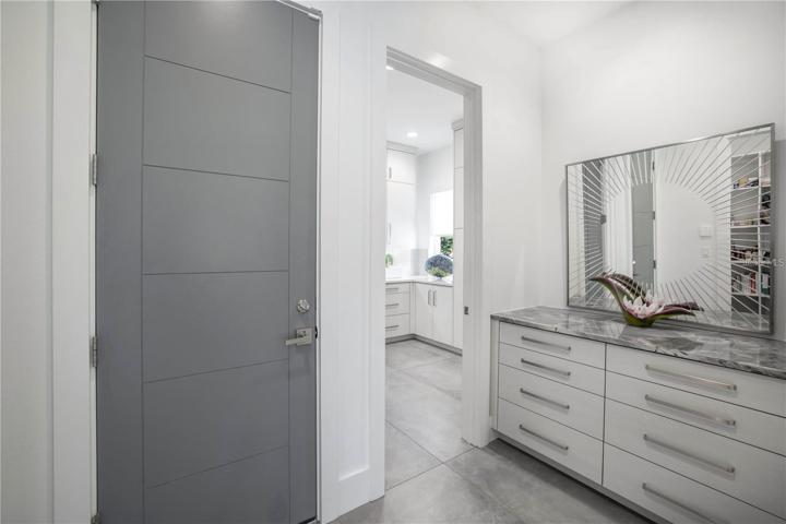 MUDROOM AT THE ENTRANCE TO THE BULTERS PANTRY-OFFICE
