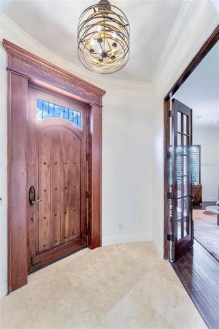 Elevated details begin as you enter with artisan front door and architectural lighting.
