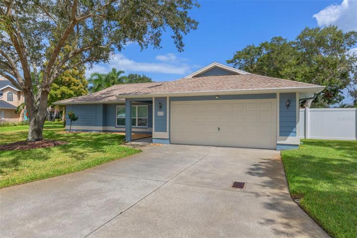 Large driveway with oversized two car garage!
