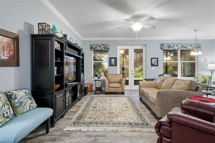 FORMAL LIVING ROOM WITH PRIVATE BACKYARD VIEWS
