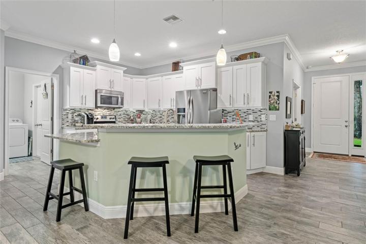 KITCHEN WITH BAR STOOL SEATING