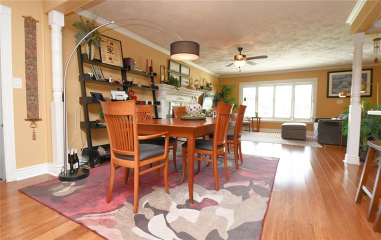 The entire home features beautiful bamboo hardwood flooring and decorative plaster ceilings, adding a touch of sophistication to every room.
