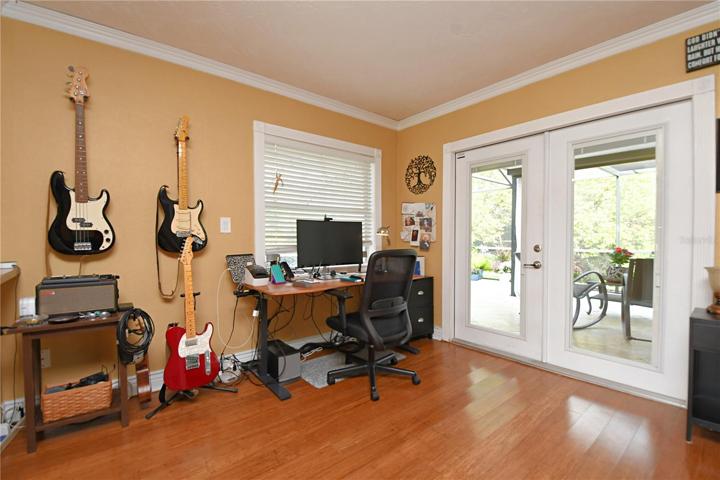Alternatively, this area can easily be transformed into a home office, allowing you to work from home while enjoying the serene view of the pool.