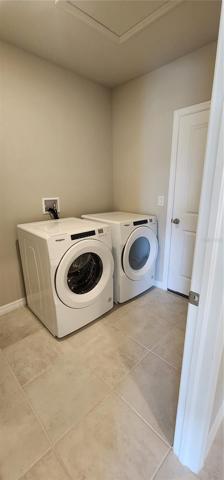 Laundry room leading to garage