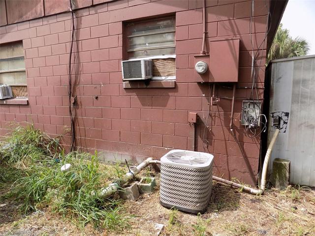 Back of home with AC