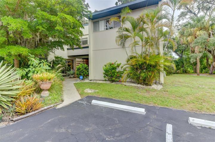 #929 parking spot pictured and one parking place in guest parking can be utilized by this home.
