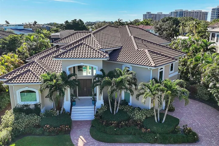 Outstanding curb appeal on lushly landscaped lot