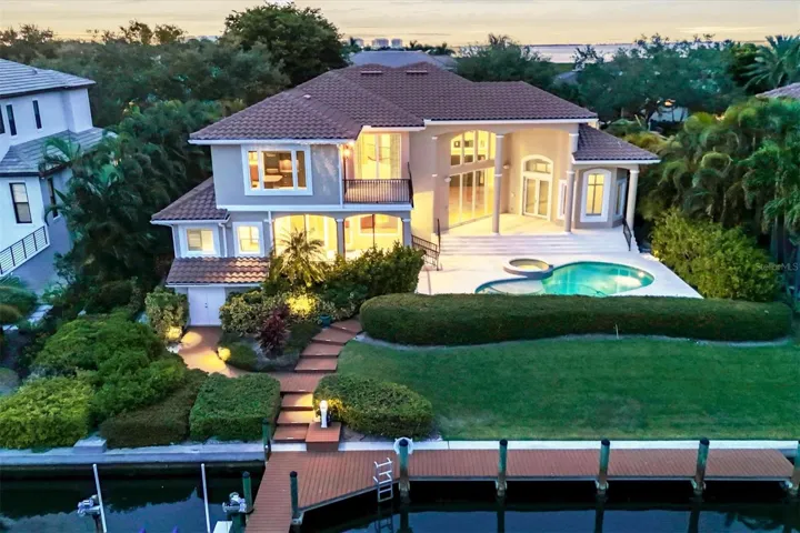 Located on a deep water canal 115' wide from dock