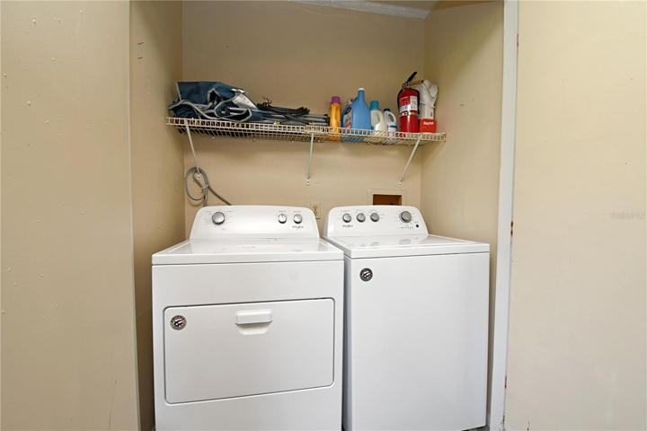 Convenience is key with the laundry closet conveniently located on the lanai.