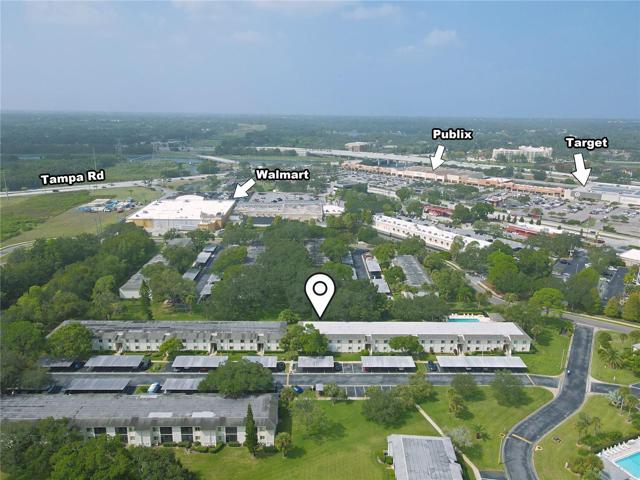 West view. This community is golf cart friendly, allowing for easy trips to the nearby shopping plaza and local restaurants. Publix, Walmart, and Target are just a short drive away, ensuring all your everyday needs are within reach.