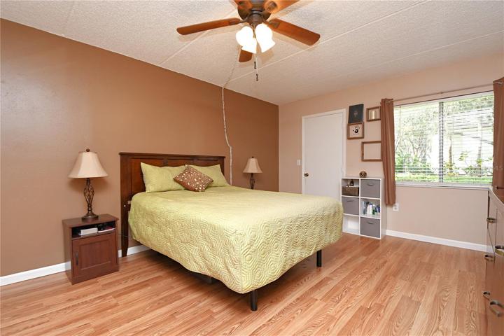 The master bedroom is a true sanctuary with not one, but TWO walk-in closets. It features a celiing fan/light combo.