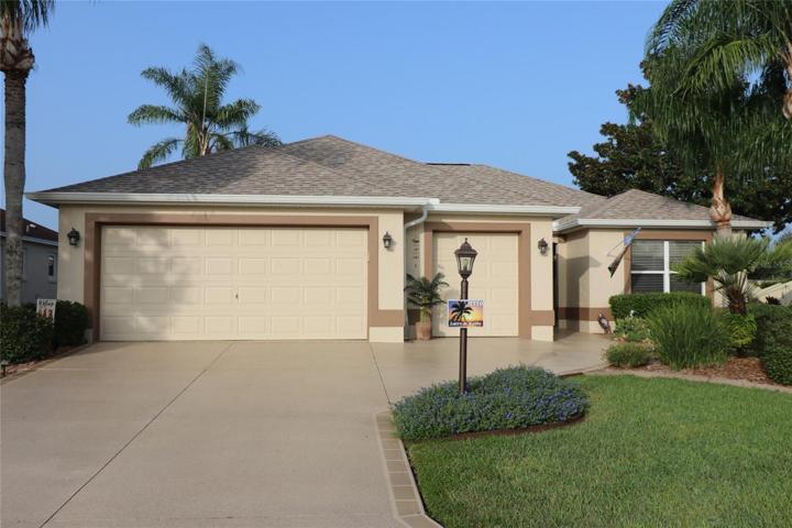 This beautiful TURNKEY HOME has a golf cart garage and faces east.