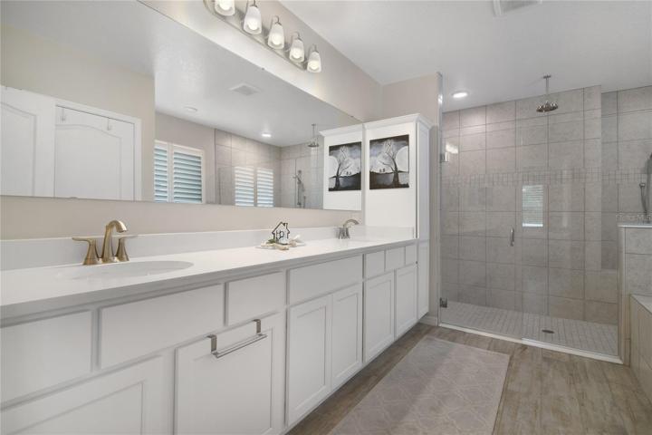 Your spacious en-suite allows you to start and end your day with ease, an extended vanity boasts dual sinks and endless storage, the oversized shower has a rain shower head and seamless glass doors and the separate tub provides relaxation at the end of a long day!