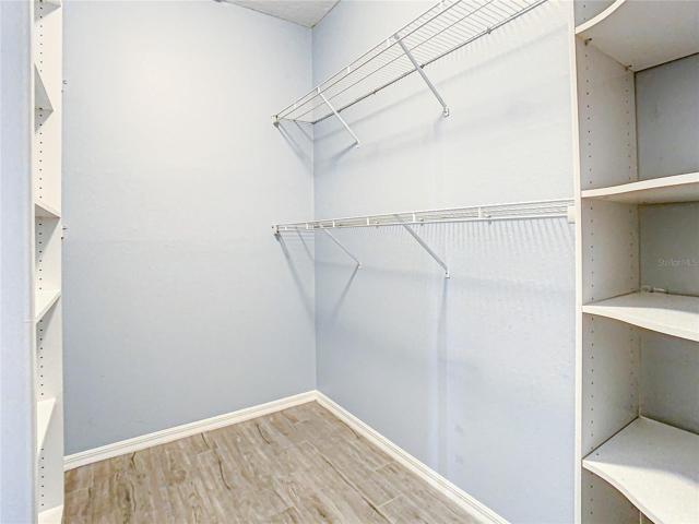 Master Walk-In Closet With Built-Ins. Wheel Chair Accessible