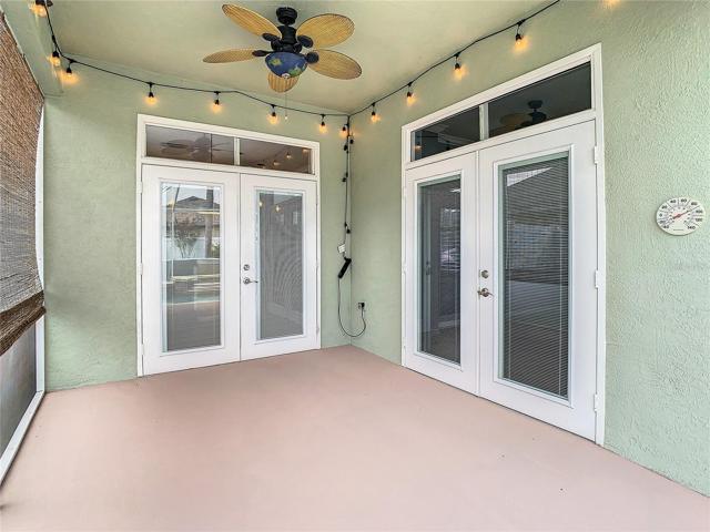 Outside Covered Patio, Master Bedroom Doors to the Right, Kitchen-Family Room Doors to the Left