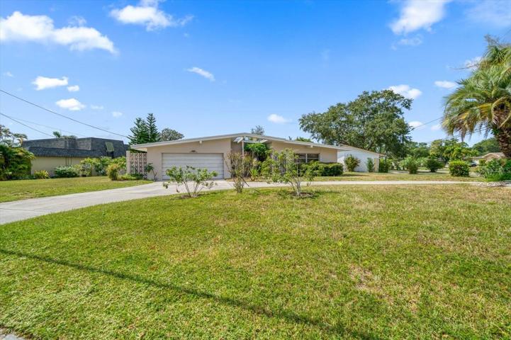 Front yard is so large and has long circular driveway