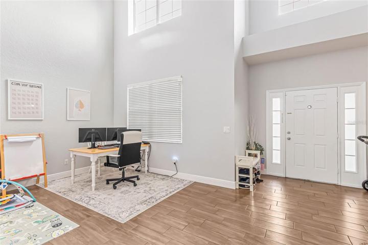 If you are looking for space, this 4BD/2.5BA home has it in spades; starting in the TWO-STORY LIVING ROOM, flexible to use as formal entertaining space or anything else your family might need!