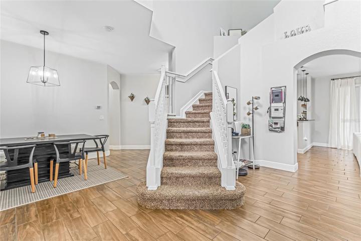 Perfectly situated across from the formal dining and open staircase!