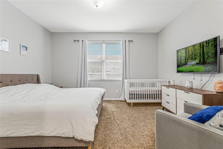 Before heading upstairs take a moment to explore your MAIN FLOOR PRIMARY SUITE, another well lit space with a WALK-IN CLOSET for plenty of storage and a private en-suite bath!