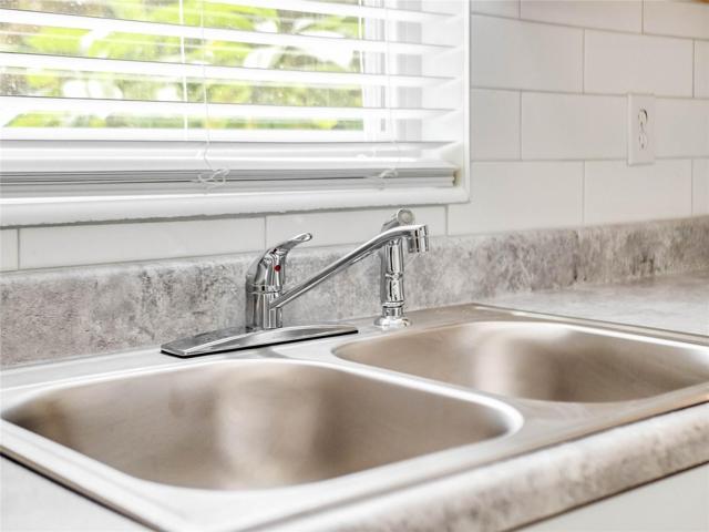 New sink hardware and backsplash!