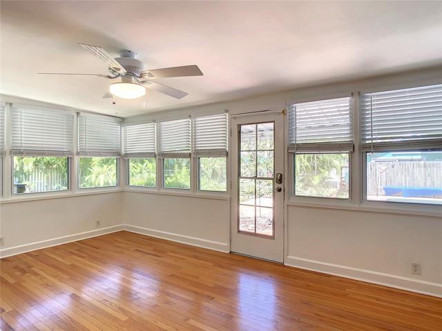 Florida room from kitchen. To the left is the laundry closet.