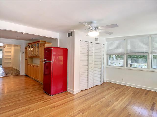 Florida room, west side laundry closet with the bifold doors and newer windows.