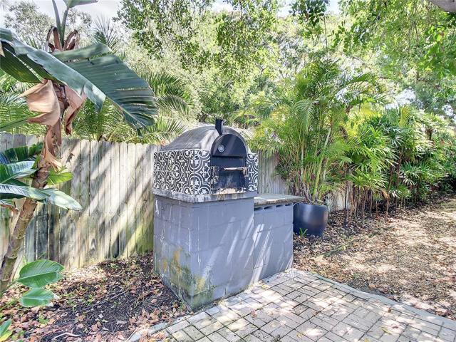 Custom built outdoor pizza oven on the east side of the property, just outside the back door.