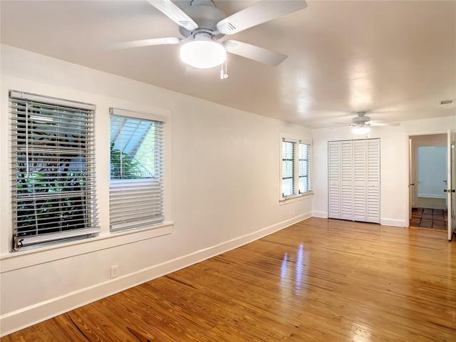 Primary Bedroom, south west side of house, looks out over the yard on the west side. wall closet. ( Not walk-in). Open door leads to the hall, bath & 2nd bedroom.
